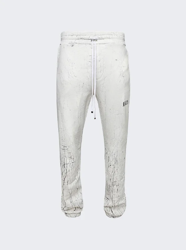 Breathable mesh pants for hot weather sports -Pants with tapered fit-Cracked Dye Logo Sweatpants White