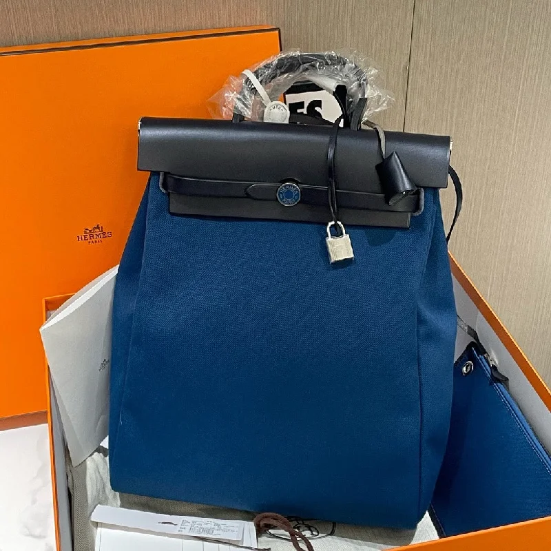 Bright orange backpack for outdoor visibility needs -Hermes Herbag Z Blue Backpack 2021 Large