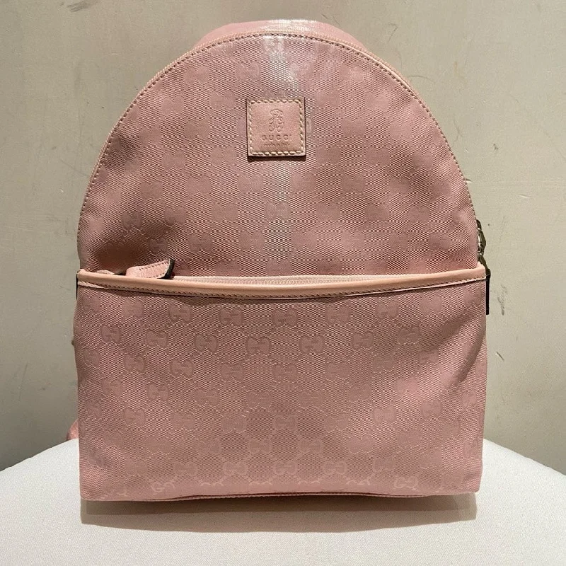 Compact daypack backpack for short weekend trips -Gucci Pink GG Logo Canvas Backpack Medium