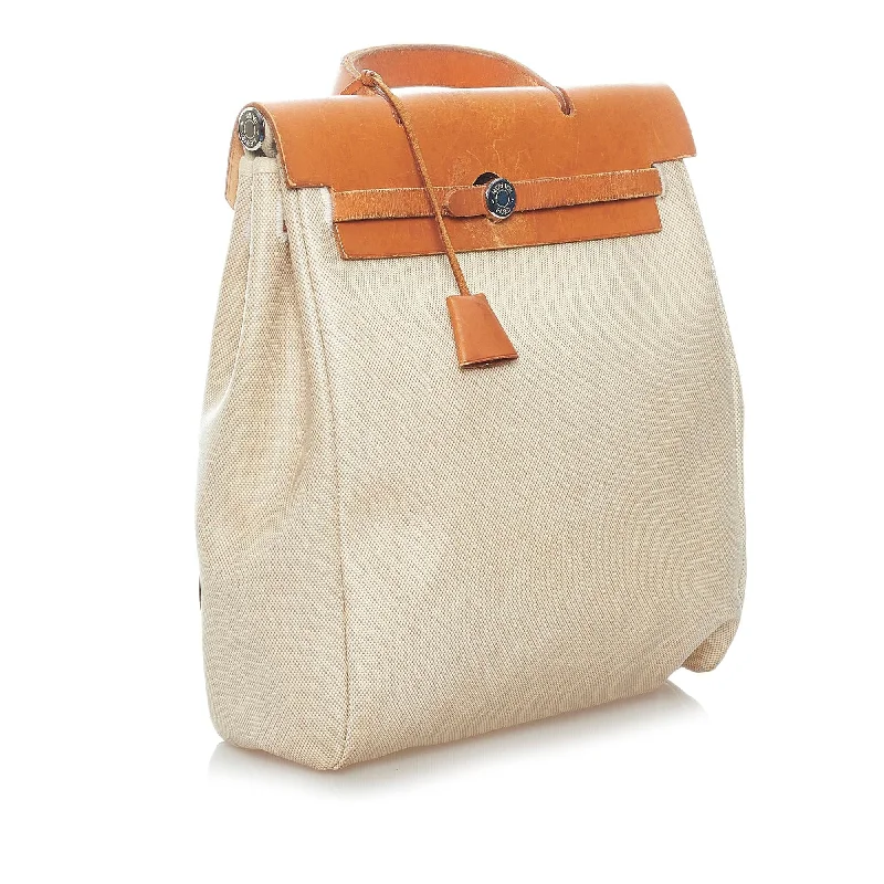 Heavy-duty canvas backpack for tough work environments -Hermes Herbag Canvas Backpack (SHG-32314)